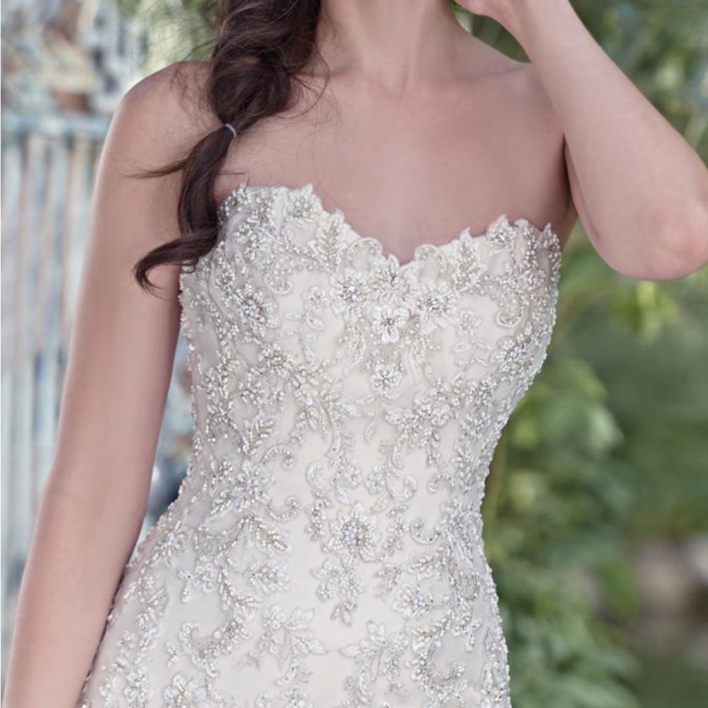 Maggie Sottero Ivory Ball Gown with Silver Beaded Bodice - Picture 7 of 11